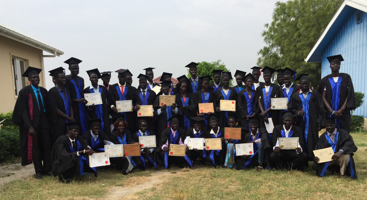 Graduates Presenting Their Diplomas